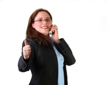 Woman on phone giving thumbs up