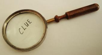 Magnifying glass with clue