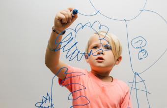 Boy playing pictionary