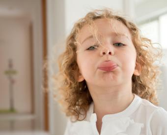 girl sticking out tongue