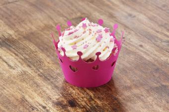 Crown Decorated Cupcake on Wooden Background