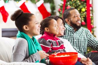 Happy family watch a Christmas movie