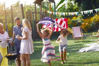 Adults and kids at 4th of July party