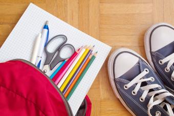 Backpack With School Supplies And Sneakers