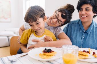 Family having fun while having breakfast