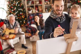 Family having fun while playing charades on Christmas day together