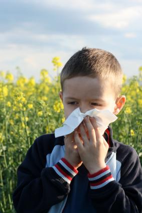 Boy with allergies in springtime