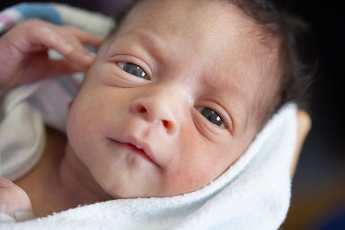 Close up of newborn baby's face
