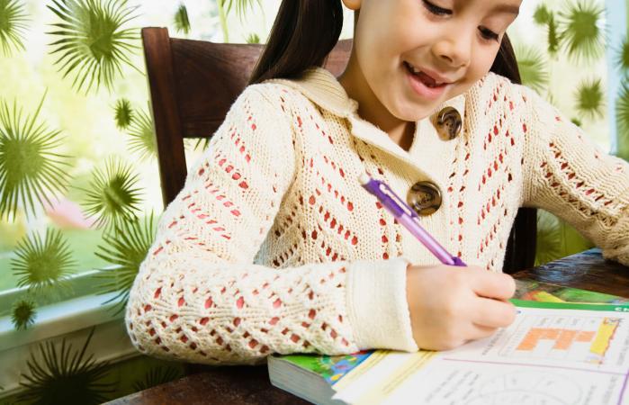 girl working on a word puzzle