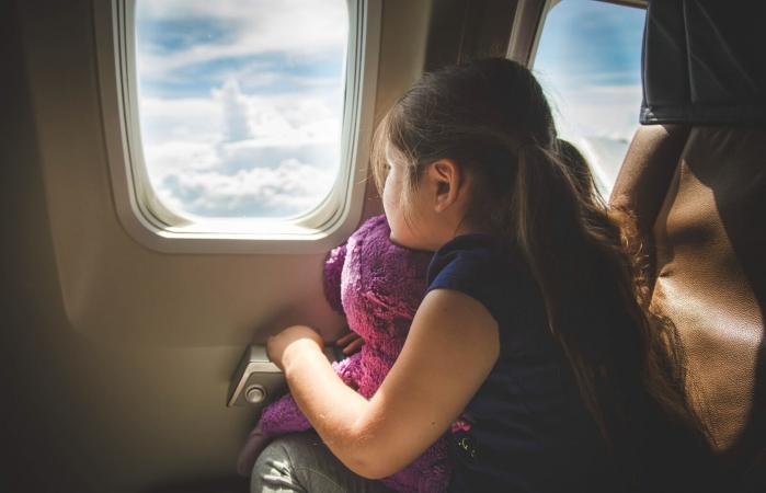 Kid on an airplane