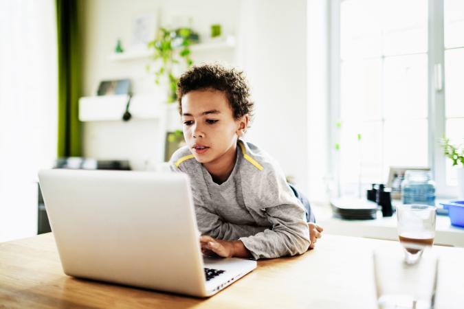 Boy using laptop