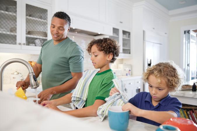 dad and boys doing dishes