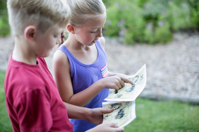 Two kids on a treasure hunt