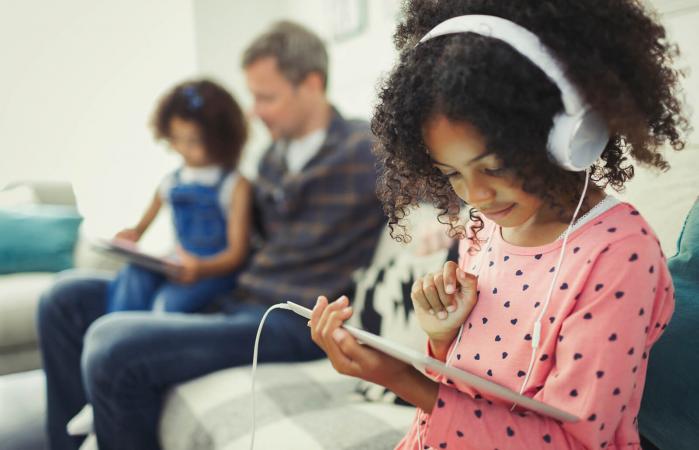 Girl using digital tablet