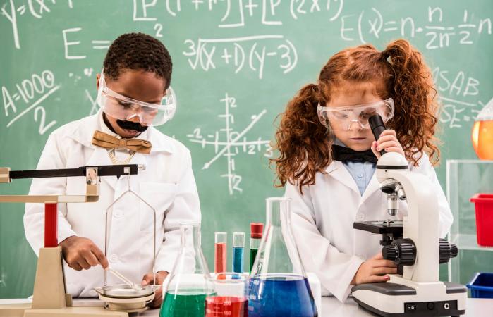 Kids performing science experiments