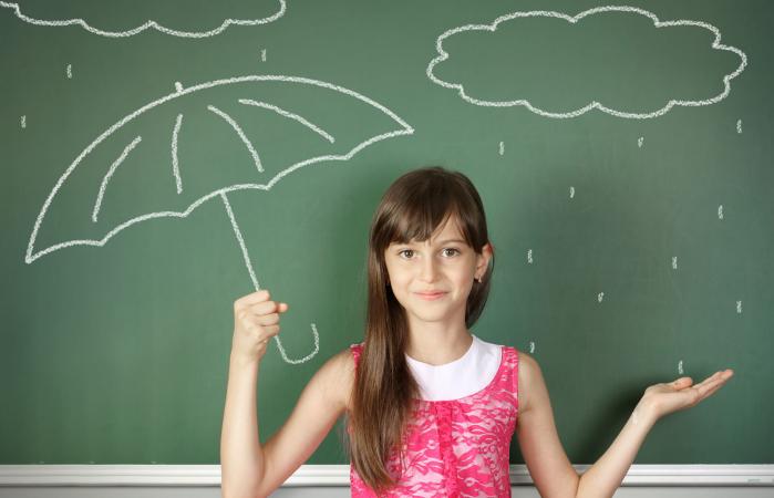 child hold umbrella