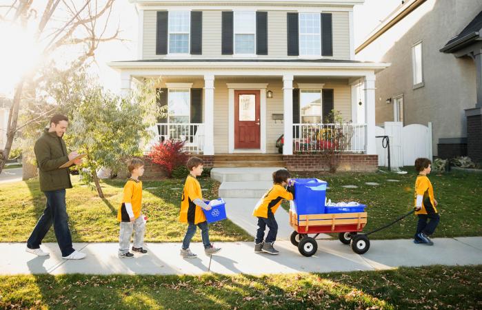 Sports team gathering recycling neighborhood