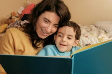 Parent and child reading together