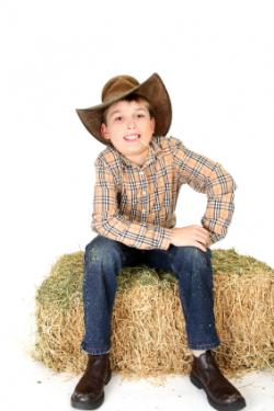 kid playing cowboy