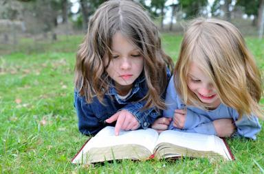 two girls reading