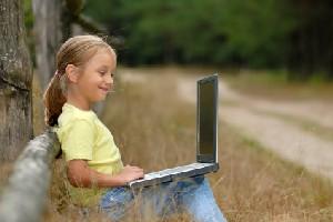 Little girl learning online