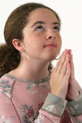 Girl praising God