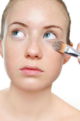 Apply concealer with a brush.