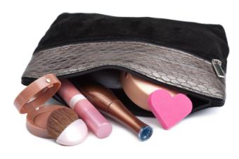 Small, zippered makeup bag and cosmetics