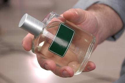 cologne with man's hand