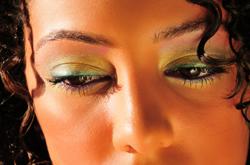 Woman wearing green liquid liner