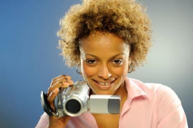 Woman with video camera