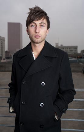 man in black pea coat