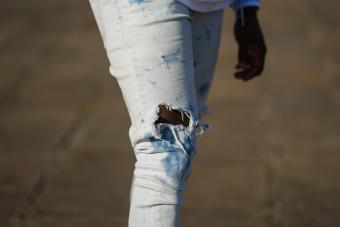 Skinny ripped denim jeans pants from Asos - Getty Editorial Use