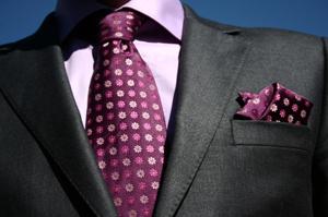 man's jacket and tie