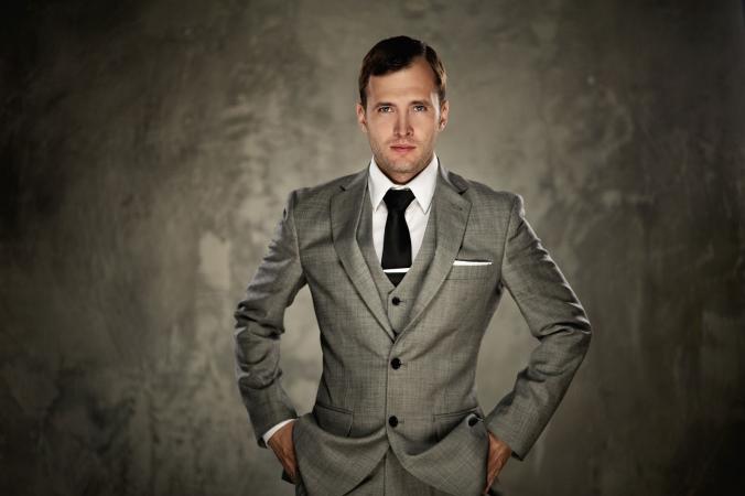 Man wearing three piece suit