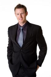 Man wearing an inexpensive designer suit