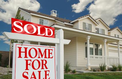 Home with sold sign