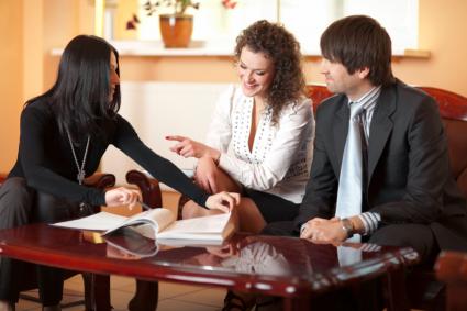 Couple meeting with a mortgage broker
