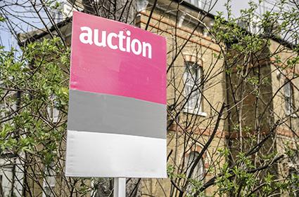 real estate auction sign