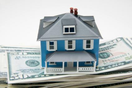 House on stack of money
