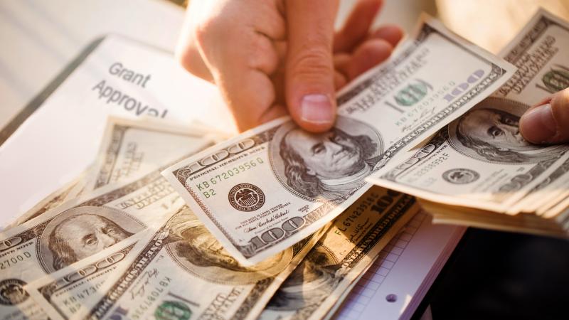 Grant approval and cash