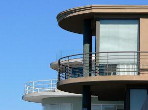 Two Florida houses against blue sky
