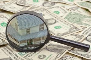 Concept image of examining possibility of refinancing mortgage