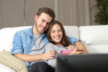 Couple watching movie on TV