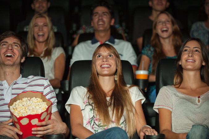 people watching funny film