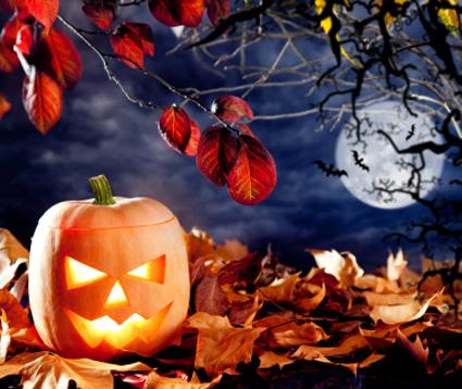 Spooky jack-o-lantern and full moon