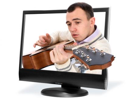 Man playing guitar in TV