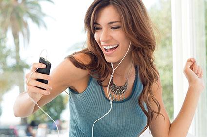 Woman listening to pop music.