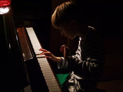 Child playing piano