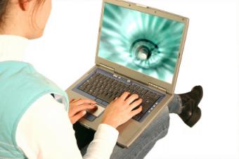 Teen using laptop